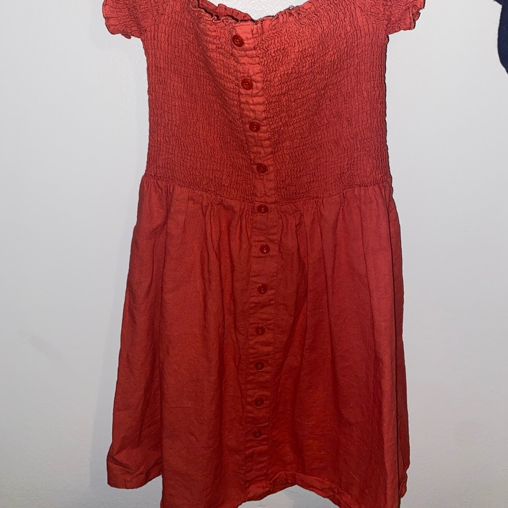 Red/orange colored off-the-shoulder dress from Tilly’s. Mid thigh length.